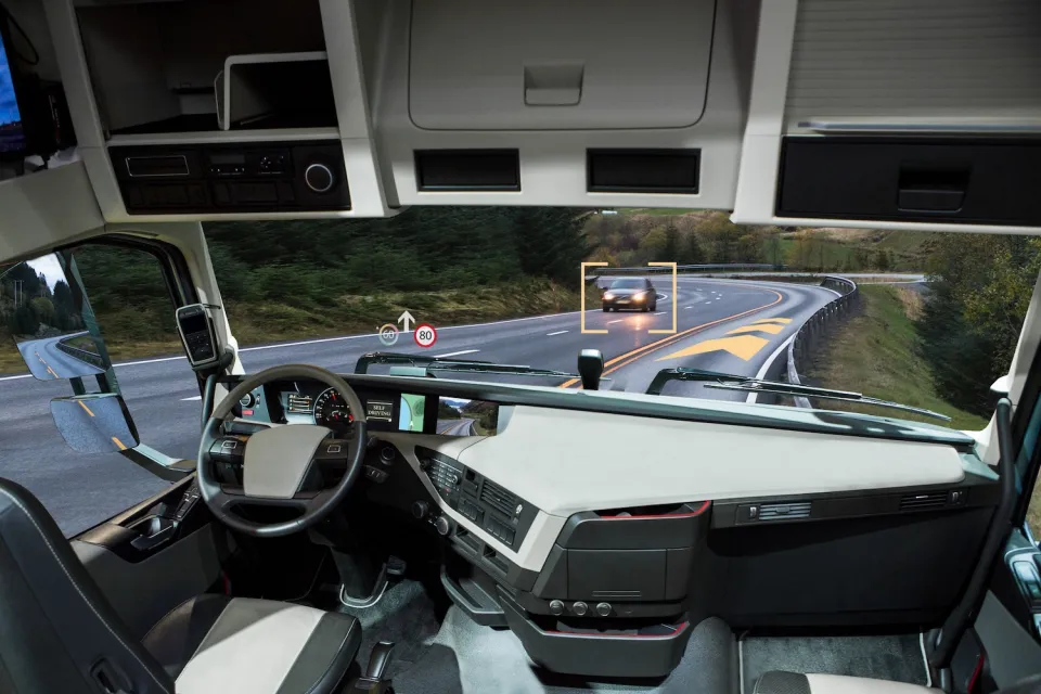 Inside of self-driving truck on road.
